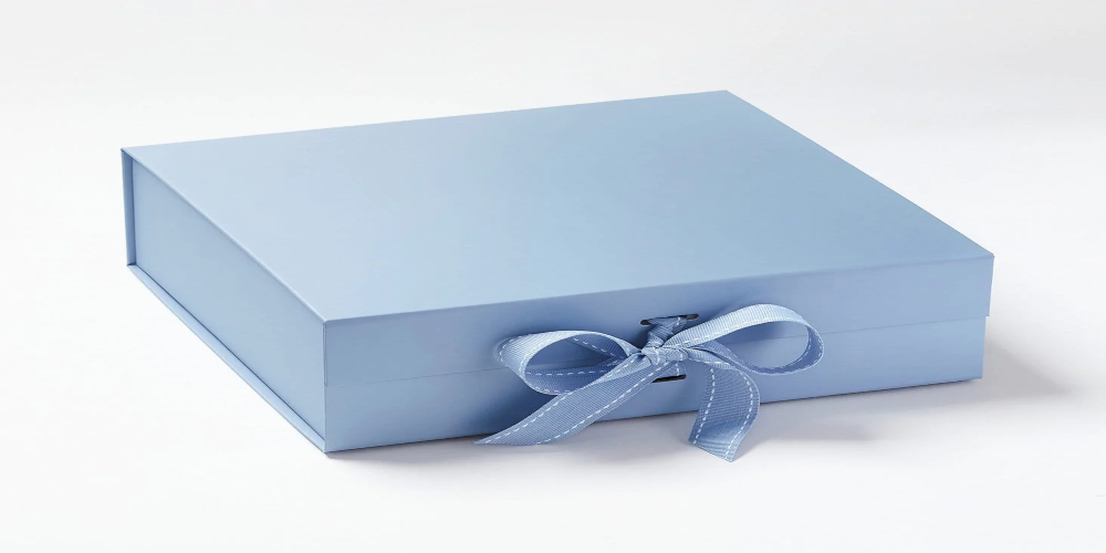 how-to-tie-a-perfect-bow-on-a-gift-box-stephentankel